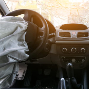 Car Accident broken windshield deployed airbag